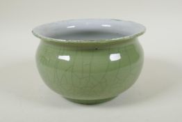 A Chinese celadon crackle glazed porcelain bowl, 17cm diameter