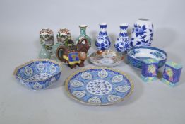 A quantity of decorative Oriental porcelain, large plate 32cm diameter