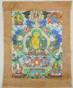 A Tibetan printed Thangka depicting Manjushri, with a silk surround, 39 x 49cm