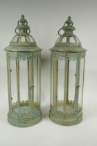 A pair of gilt and verdigris metal lanterns, 59cm high