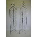 A pair of bifold metal plant supports, 212cm high