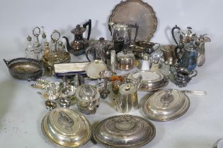A quantity of silver plated wares, entree dishes, teapots etc