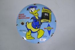 A Sunoco Oil vintage style enamelled metal sign, 30cm diameter