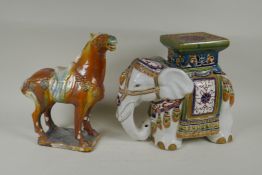 A Chinese Sancai glazed tang style pottery horse, together with a ceramic vase stand in the form