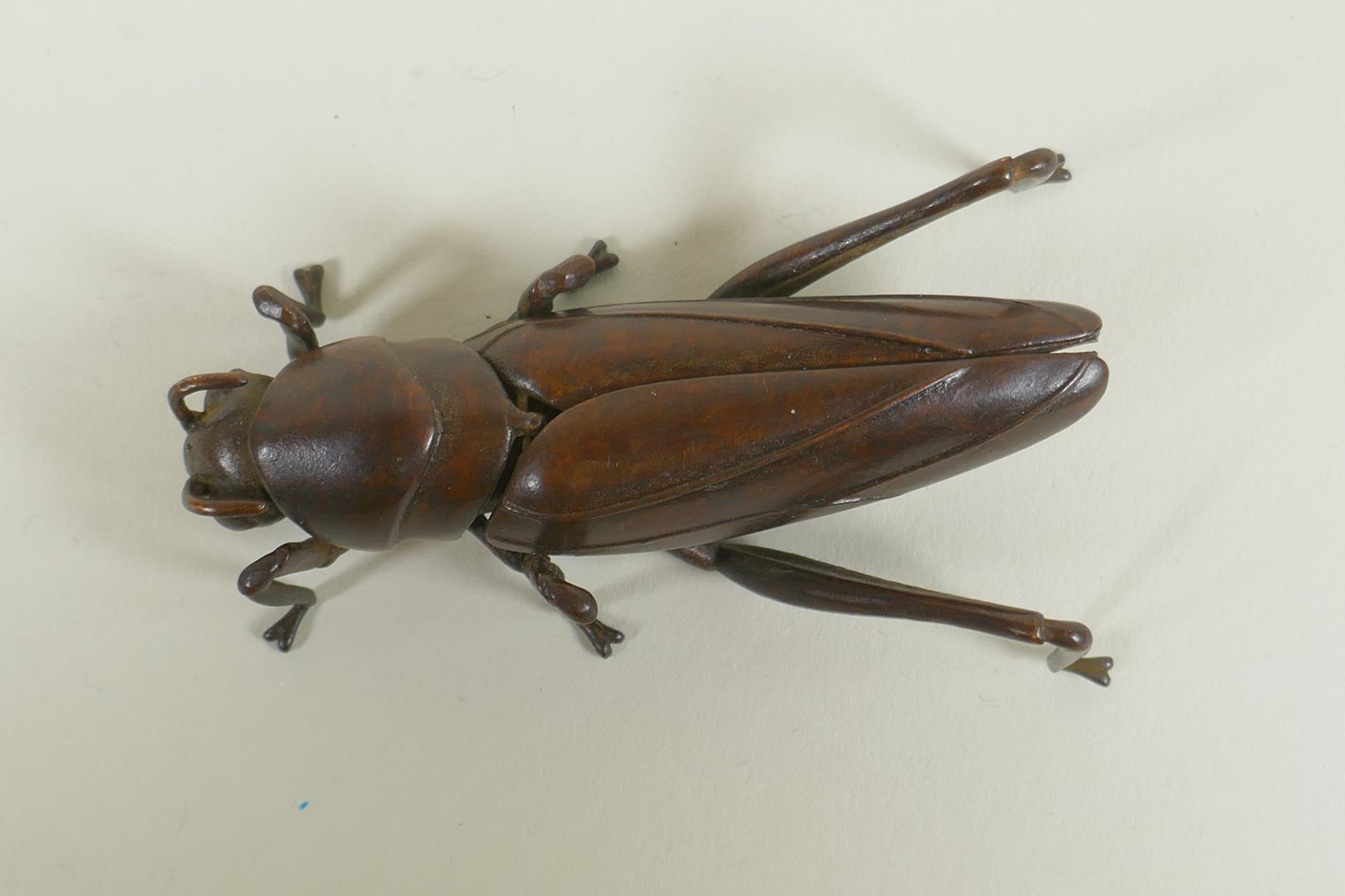 A Japanese style bronze okimono grasshopper, with articulated limbs, 8cm long - Image 2 of 3