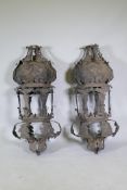 A large pair of metal lanterns, 118cm long