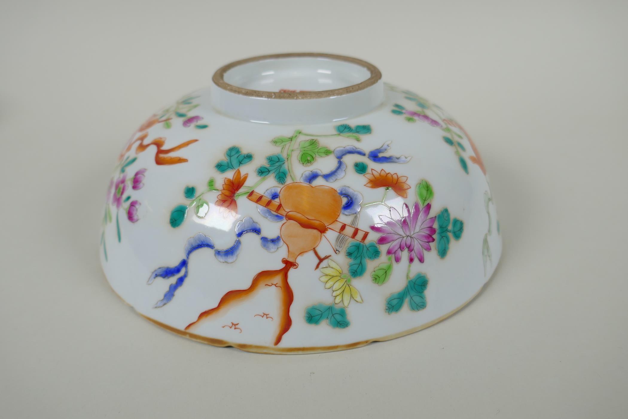 A late C19th Chinese famille rose porcelain bowl with lobed rim, decorated with flowers and - Image 4 of 7