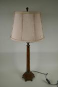 A grained wood and brass hexagonal column table lamp, 80cm high