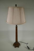 A grained wood and brass hexagonal column table lamp, 80cm high