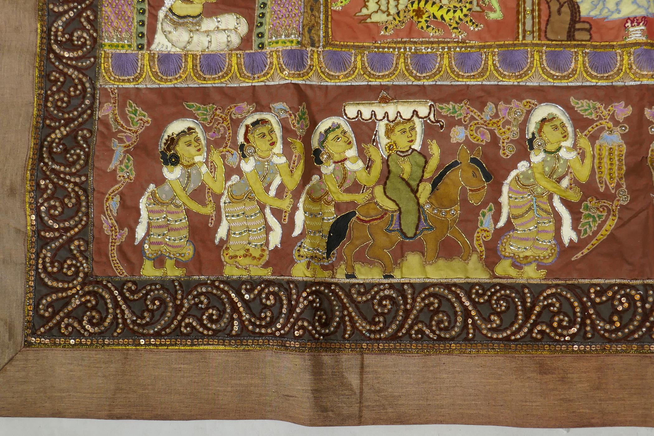 An antique Tibetan embroidered and beaded silk textile hanging, decorated with depictions of Buddha, - Image 6 of 8