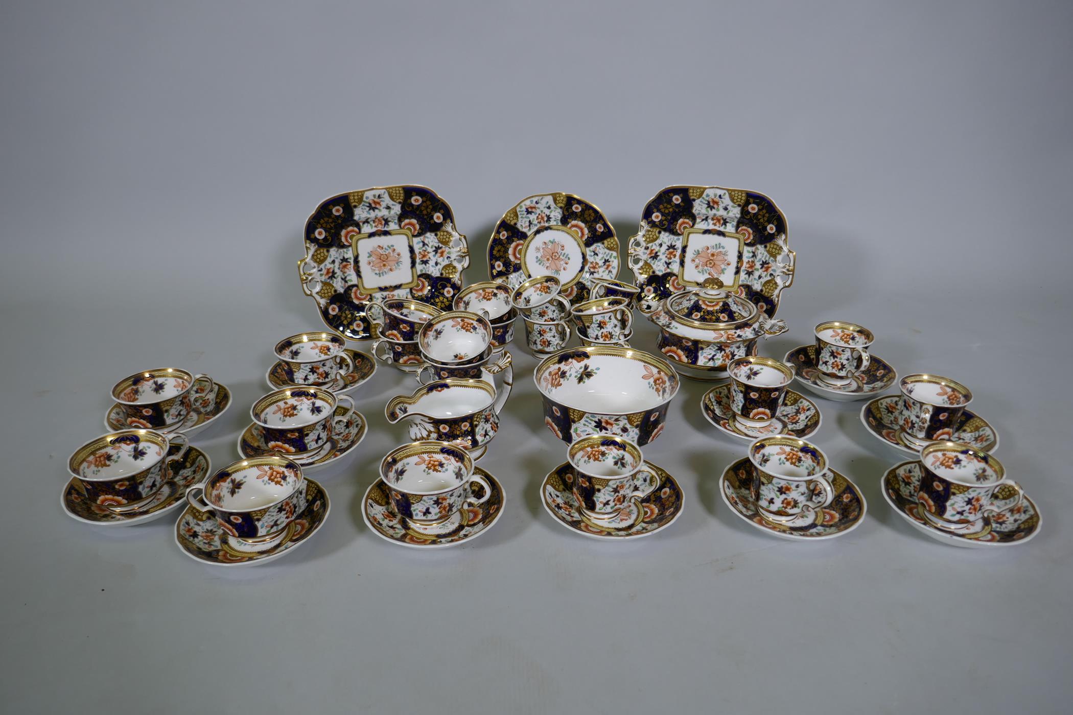 A Staffordshire Imari pattern six place tea set, with twelve spare cups, 42 pieces - Image 2 of 6