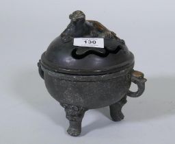 A bronze censer with kylin knop on a bowl with elephant mask handles and dragon supports, 17cm high