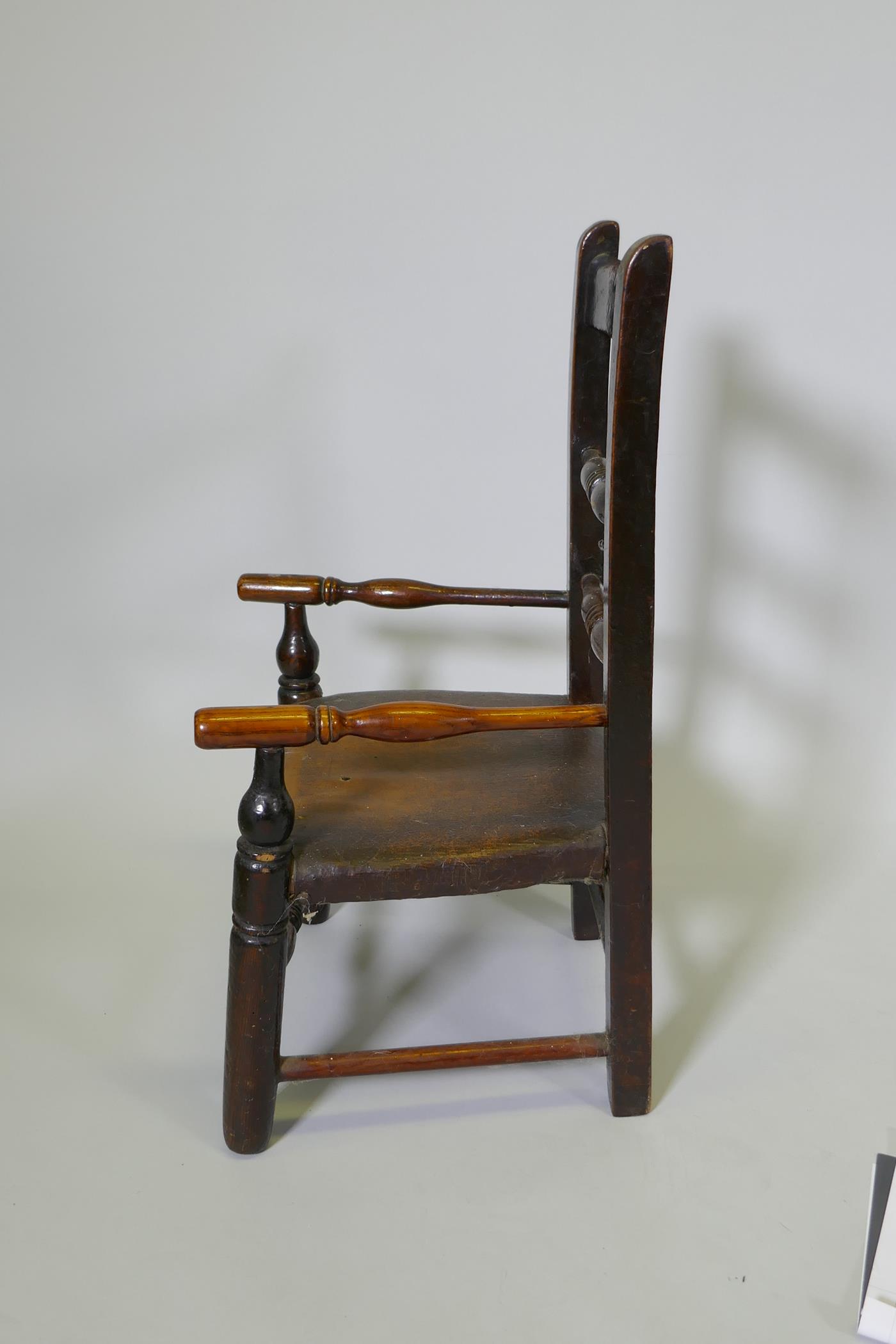 A C19th child's elm spindle back open armchair, 68cm high - Image 3 of 3