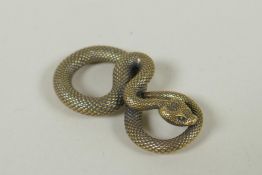 A Japanese style bronze okimono of a coiled snake, 5cm long