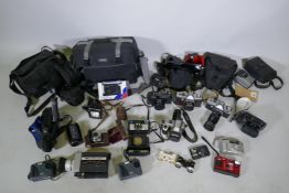 A quantity of vintage cameras, film cameras and equipment, including a Kodak 255X Instamatic, a