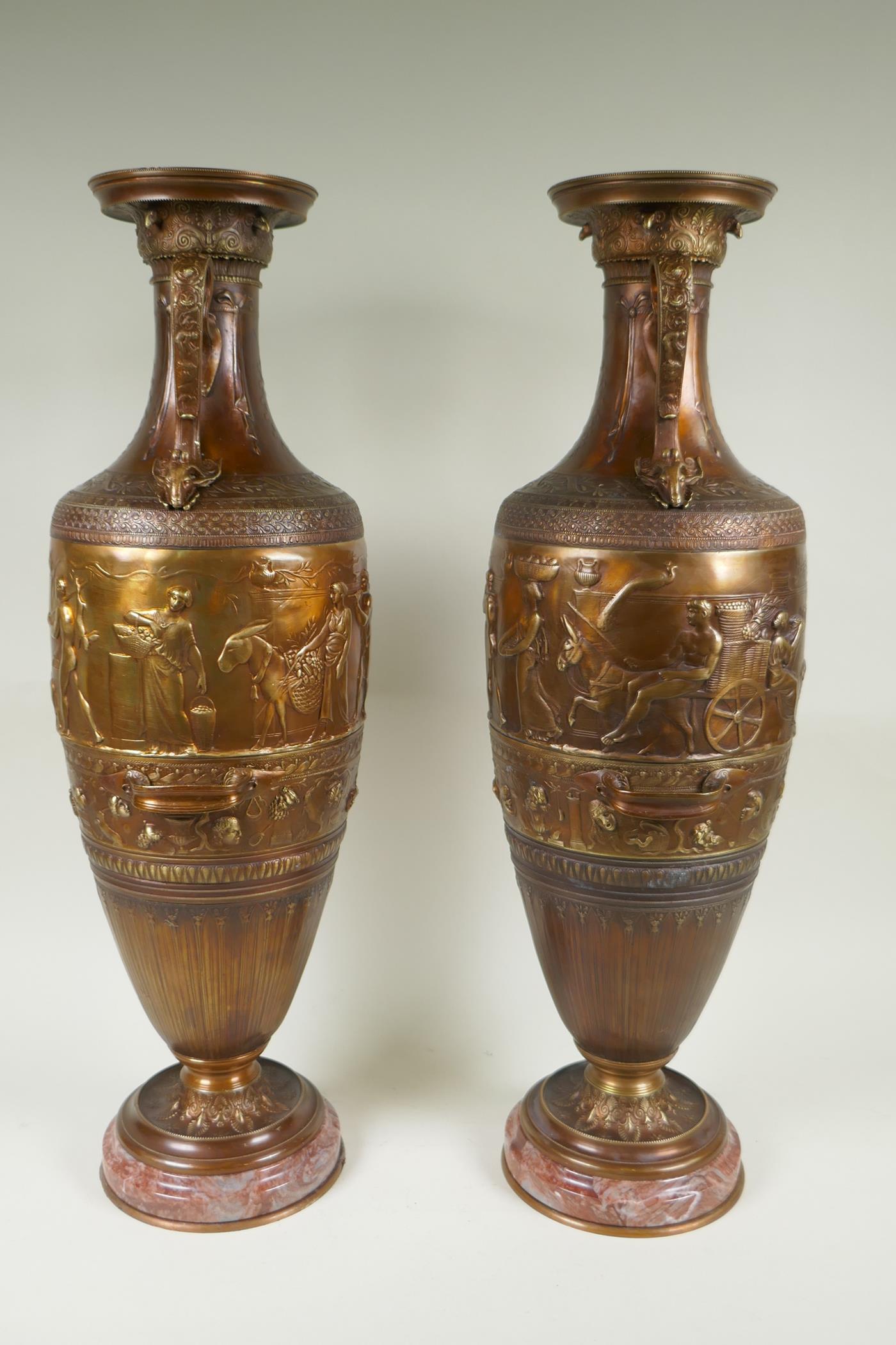 After Barbedienne, a pair of bronze Grand Tour style urns with two handles and raised figural - Image 4 of 9