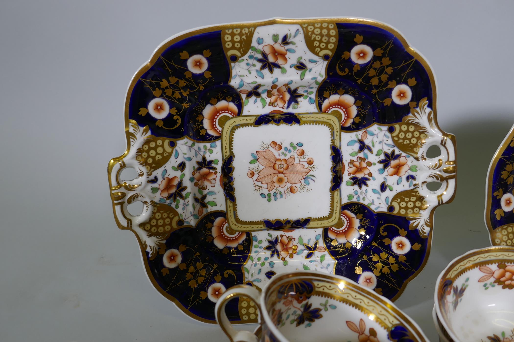 A Staffordshire Imari pattern six place tea set, with twelve spare cups, 42 pieces - Image 3 of 6