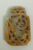 A Chinese carve and pierced celadon jade pendant decorated with animals of the zodiac, 5 x 9cm