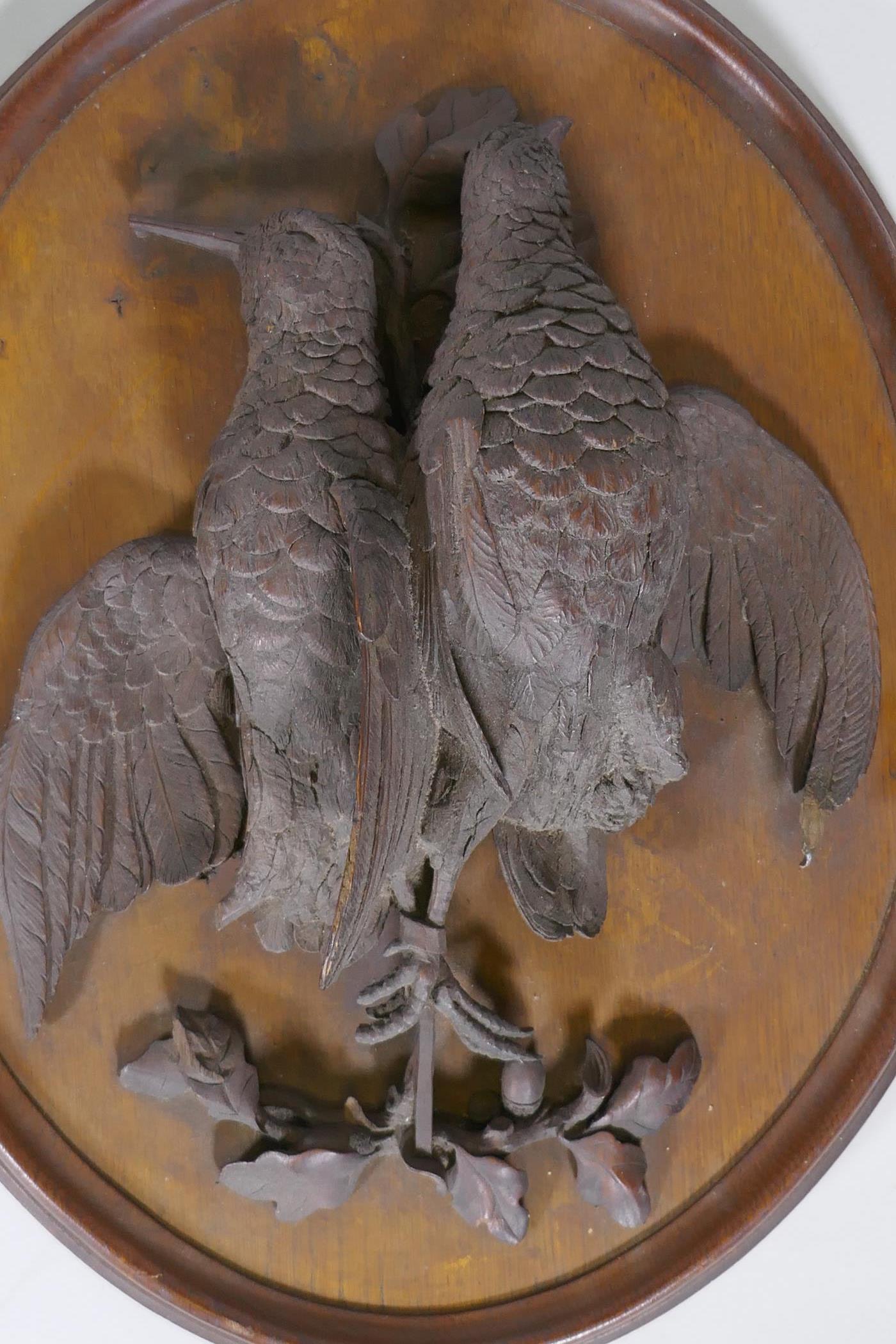 A pair of C19th oak wall plaques with finely carved braces of woodland birds, 46 x 36cm - Image 4 of 6