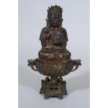 A bronze censer, the cover with seated Buddha, on a lotus bowl, 23cm high