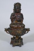 A bronze censer, the cover with seated Buddha, on a lotus bowl, 23cm high