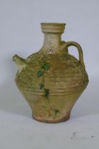 A terracotta oil jar, 54cm high