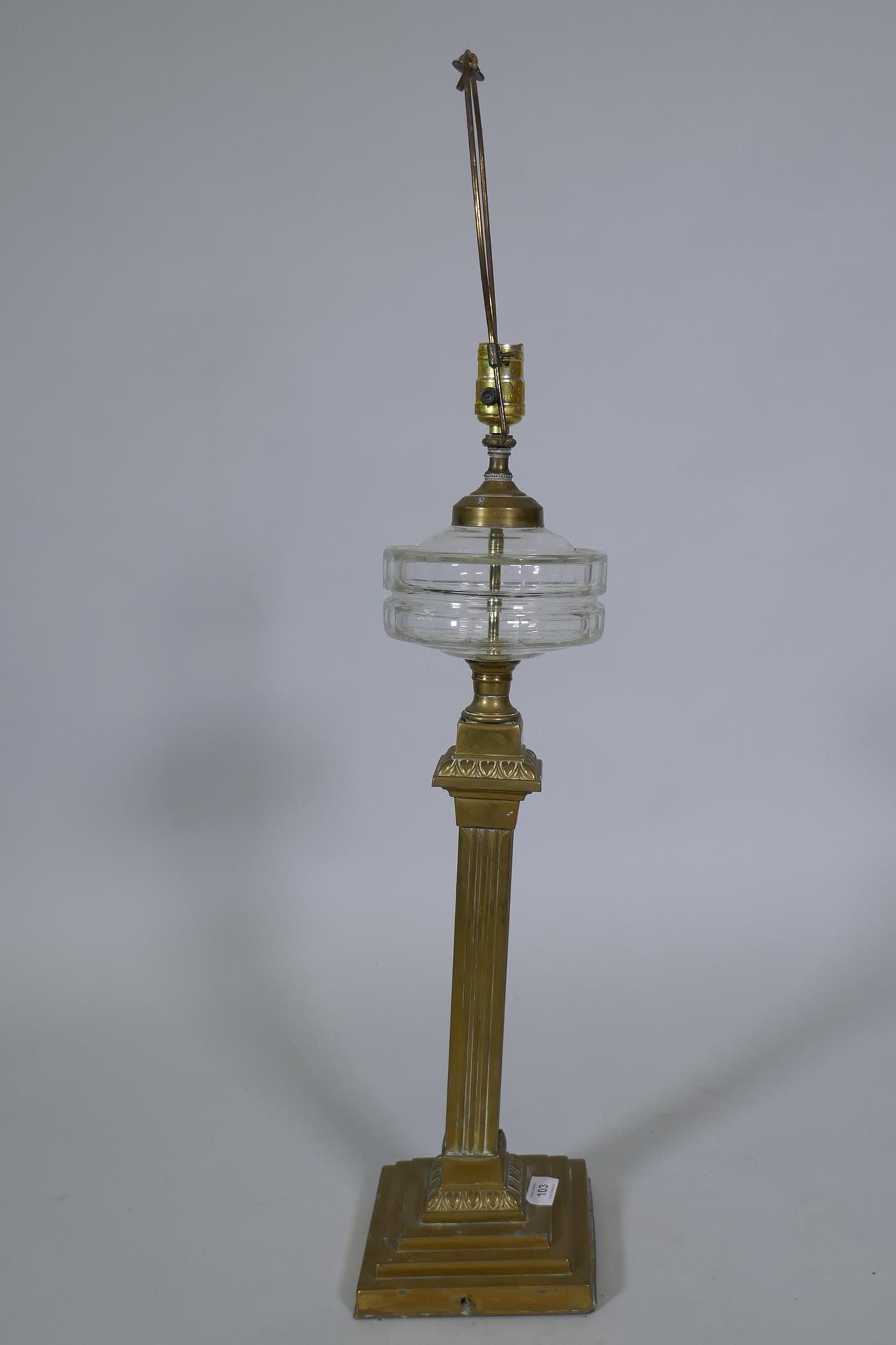 A Victorian brass oil lamp with cut glass reservoir, converted to electricity, 88cm high - Image 3 of 3