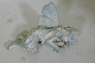 A cast iron garden figure of a sleeping fairy, 42cm long