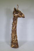 A metal garden sculpture of a giraffe, 154cm high