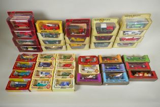 A quantity of assorted diecast model cars and trucks to include Matchbox Models of Yesteryear, Lledo