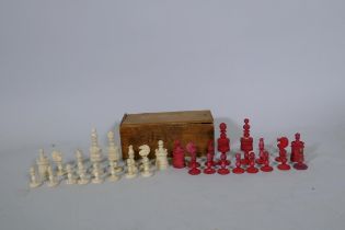 A C19th stained bone chess set, king 9.5cm high