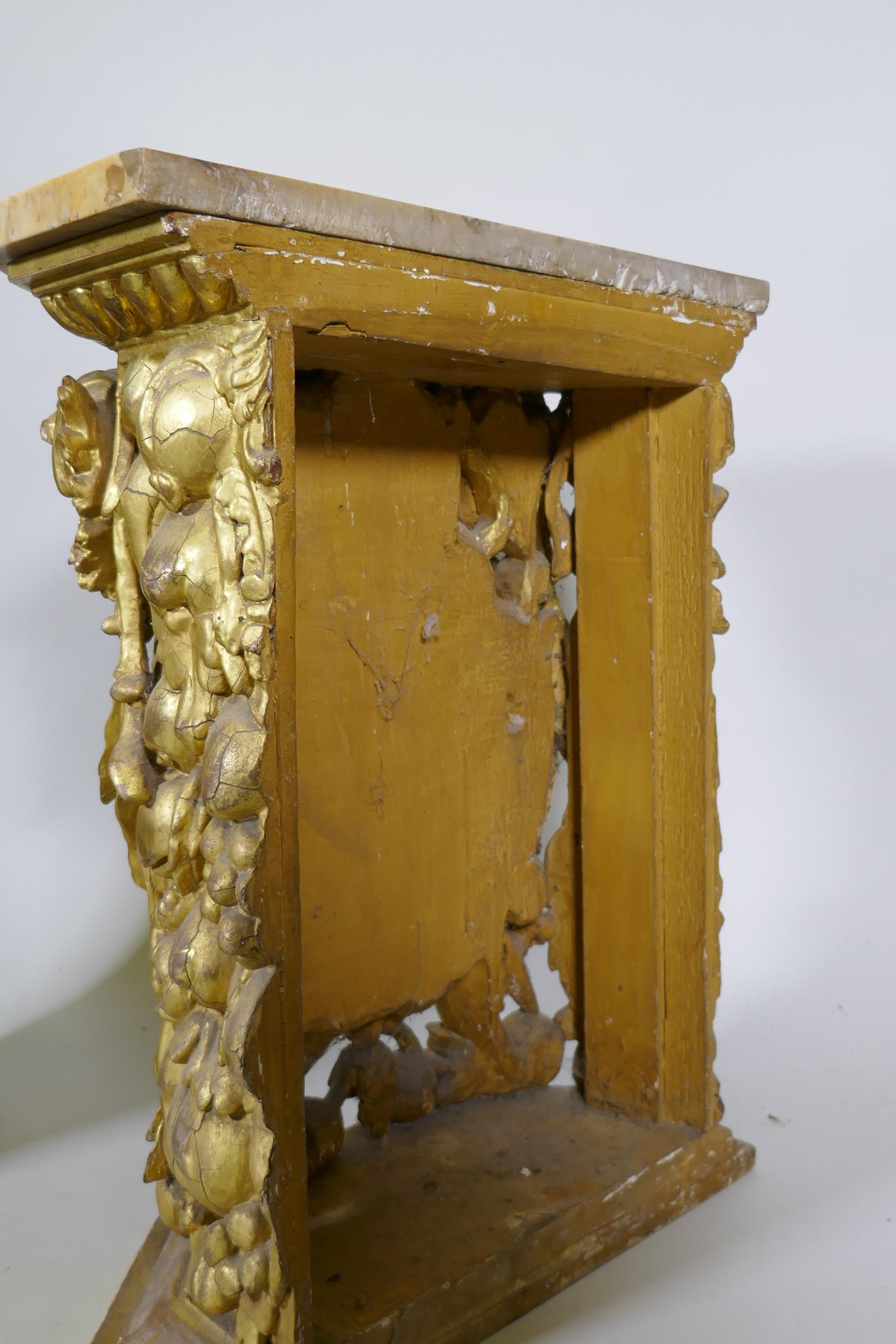 A pair of early C19th carved and giltwood pine pedestals/stands, decorated with winged putti and - Image 5 of 5