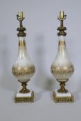 A pair of silver plated glass table lamps with brass mounts and marble base, 70cm high