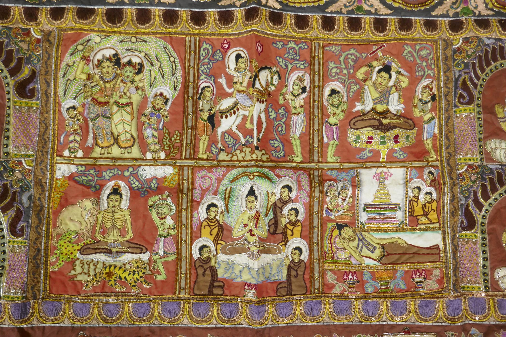 An antique Tibetan embroidered and beaded silk textile hanging, decorated with depictions of Buddha, - Image 3 of 8