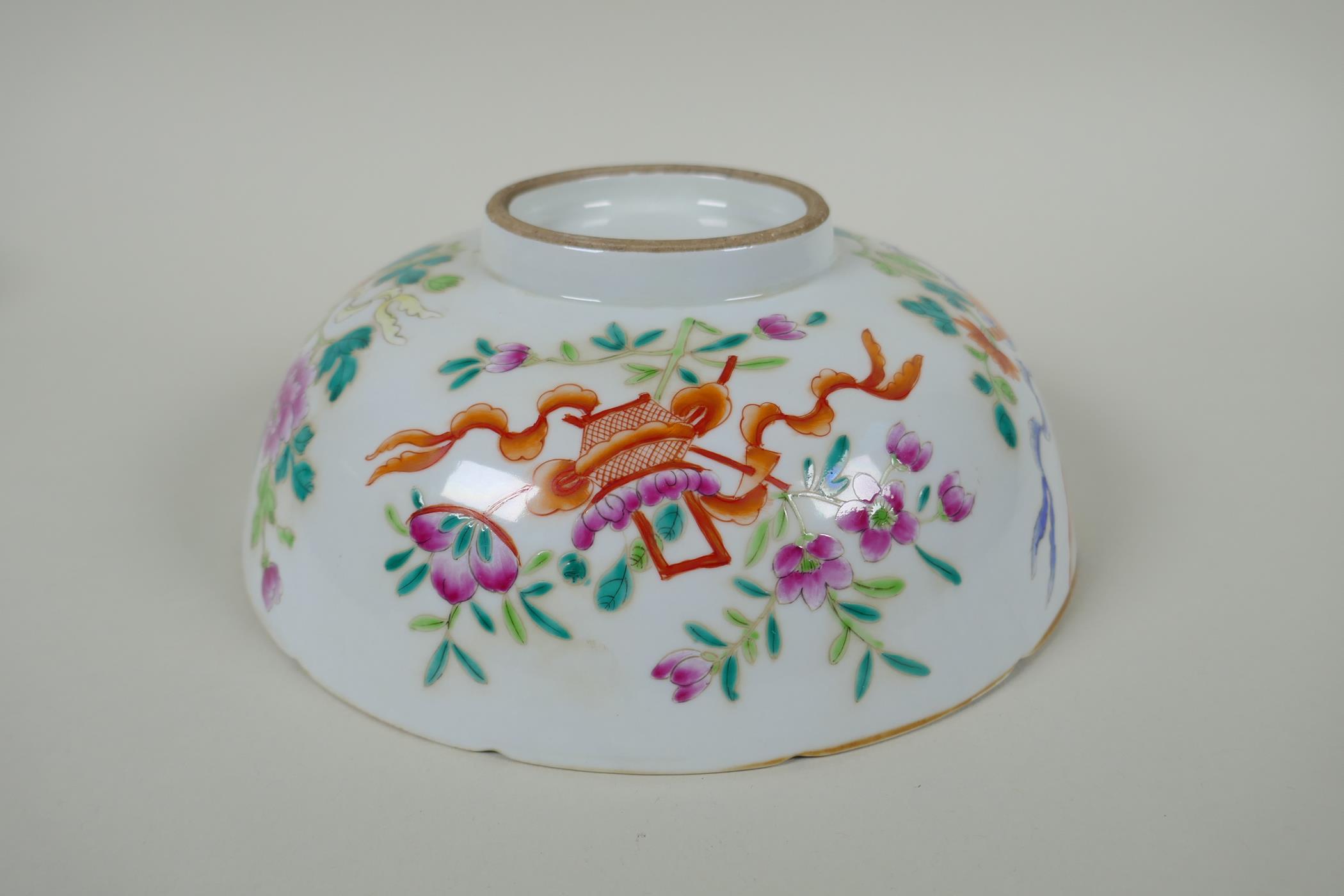 A late C19th Chinese famille rose porcelain bowl with lobed rim, decorated with flowers and - Image 3 of 7