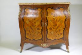 A C19th French marquetry inlaid bombe shaped two door cabinet with breccia marble top and ormolu