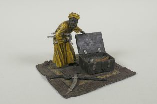 In the manner of Bergmann, a cold painted bronze figure of an Arab armourer, 13 x 13cm