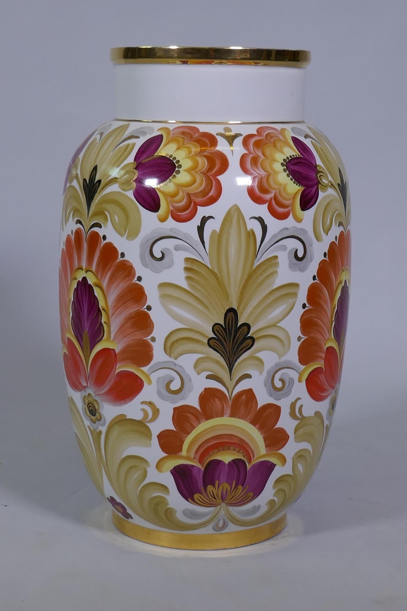 A large Soviet Russian porcelain vase by Lomonsov, with floral decoration and gilt highlights,