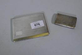 A hallmarked silver cigarette case with engine turned finish, and a hallmarked vesta case, 174g