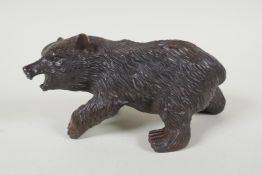 A filled bronze figure of a bear, 21cm long