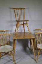 A set of four Ercol Shalstone dining chairs and blonde elm drop leaf dining table, and one Ercol