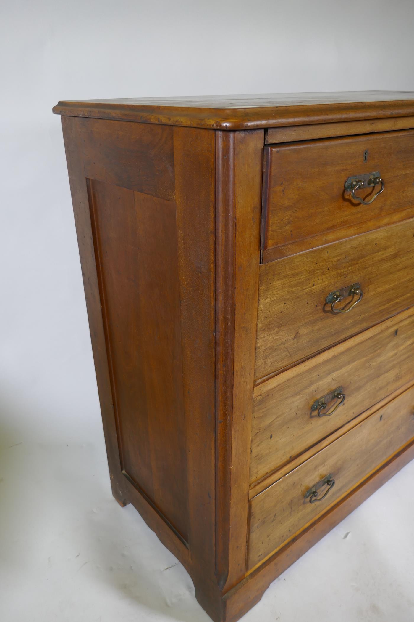 A Victorian walnut chest of two over three drawers with moulded fronts, 102 x 49 x 99cm, raised on a - Image 3 of 5