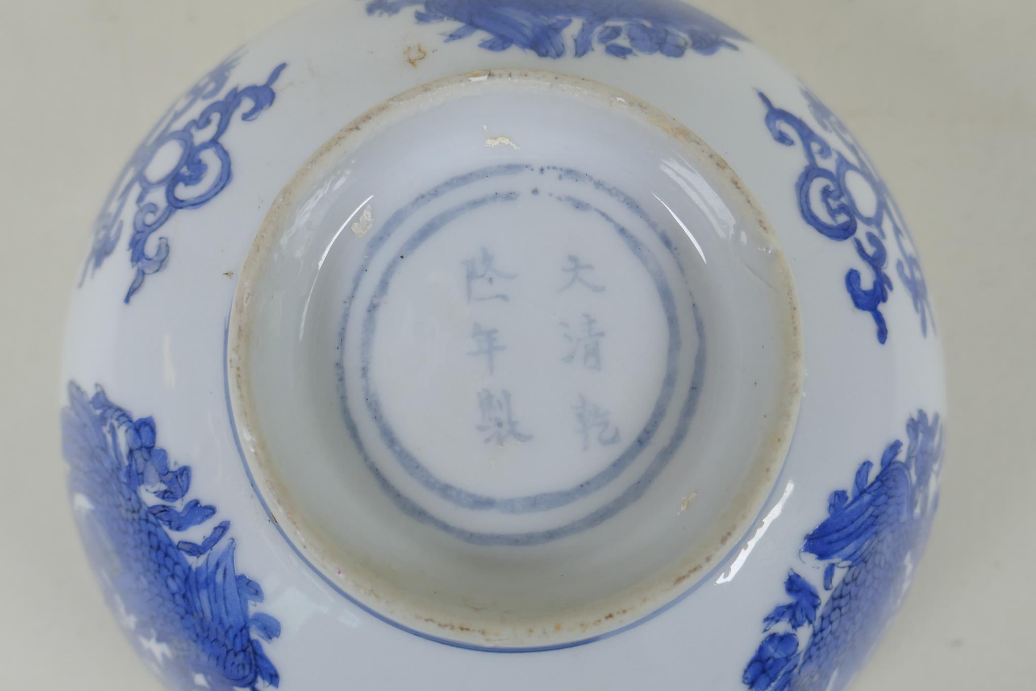 A Chinese blue and white porcelain bowl with phoenix and floral decoration, Qianlong 6 character - Image 6 of 6