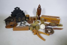A quantity of treen, a Victorian carved and pierced wood glove box, horn beakers, a Georgian petal