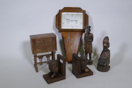 A pair of carved wood owl bookends, African figures, a jewellery box in the form of an escritoire