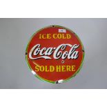 A Coca Cola vintage style enamelled metal sign, 30cm diameter