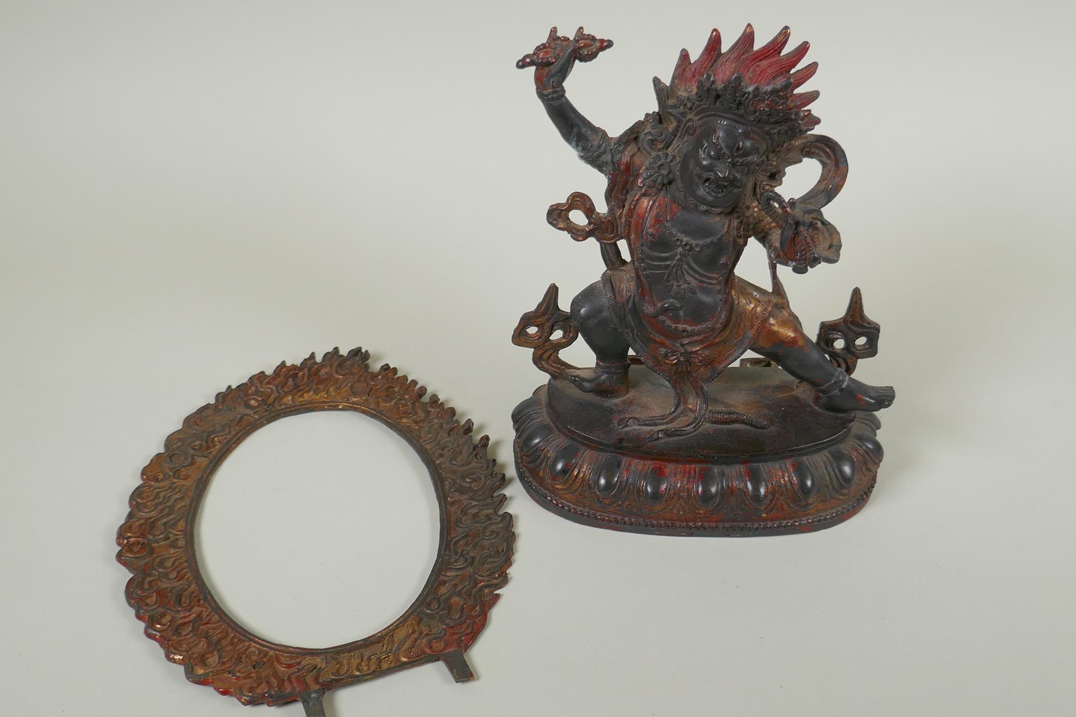 A Tibetan bronze figure of Vajrapani with remnants of gilt patina, 24cm high - Image 4 of 5