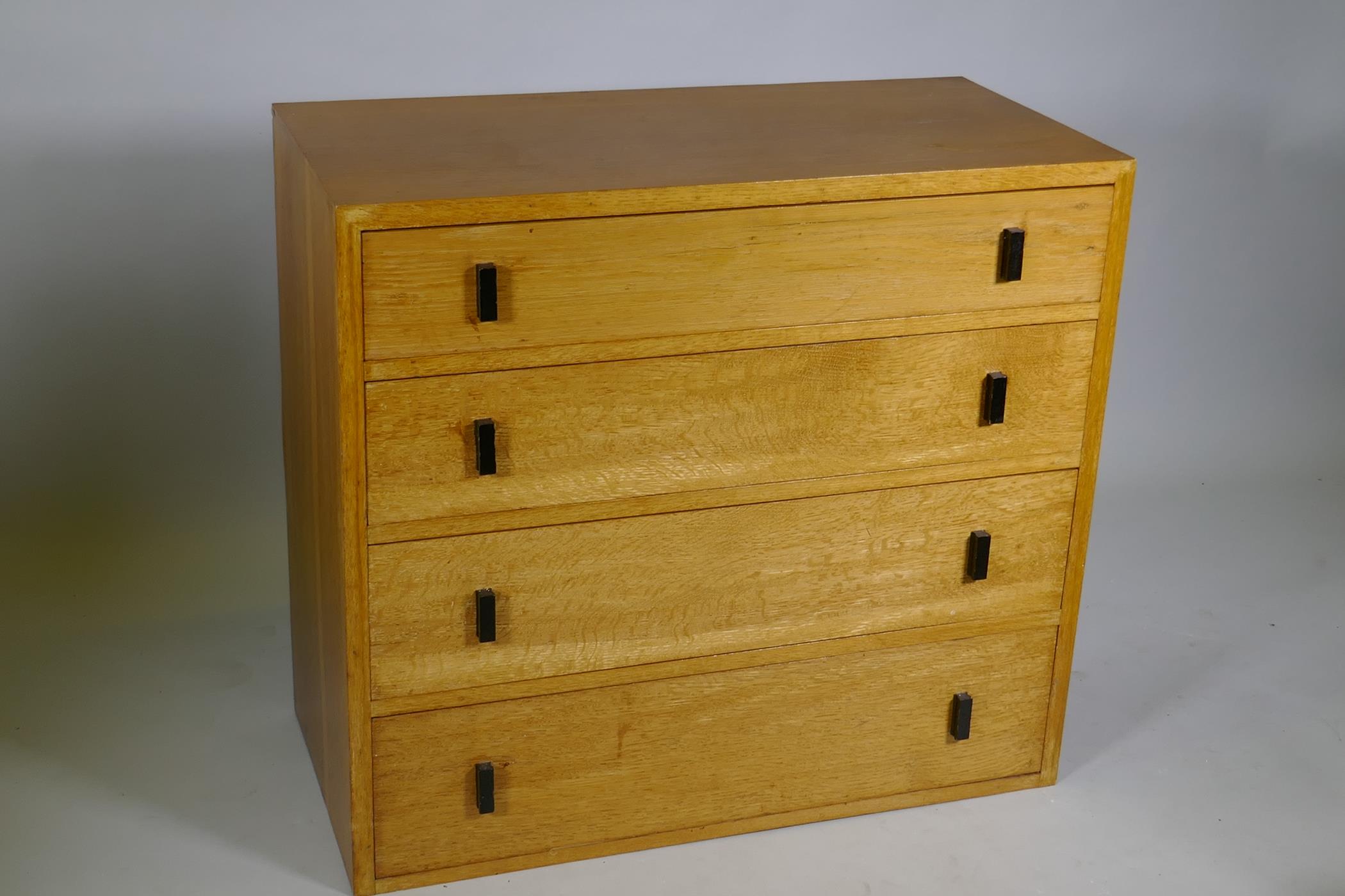 A mid-century oak chest of four long drawers, 92 x 43 x 83cm - Image 2 of 3