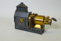 The Praestantia Victorian magic lantern, Riley Bros Ltd, with 7" lens, 33cm high, 44cm long