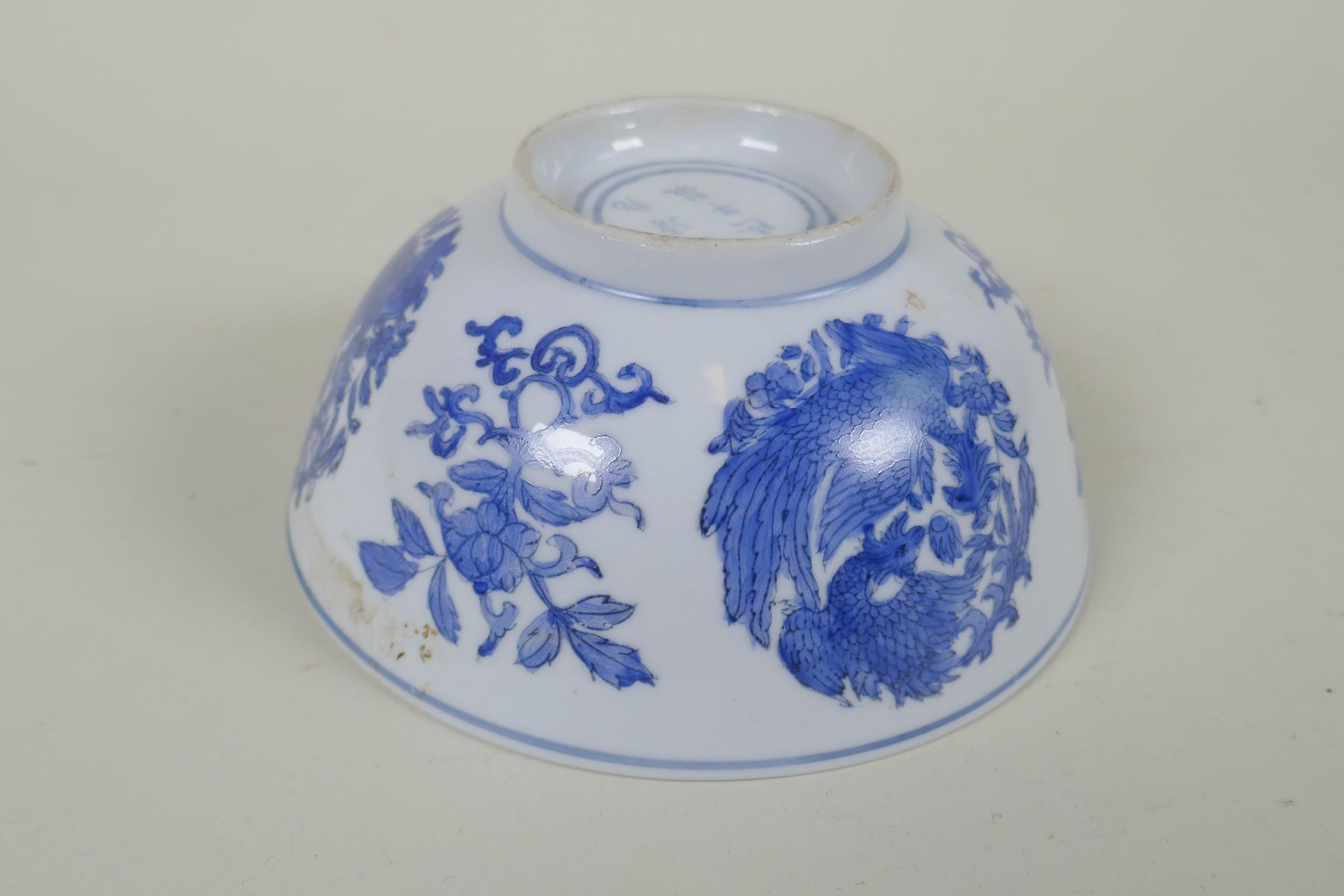 A Chinese blue and white porcelain bowl with phoenix and floral decoration, Qianlong 6 character - Image 3 of 6